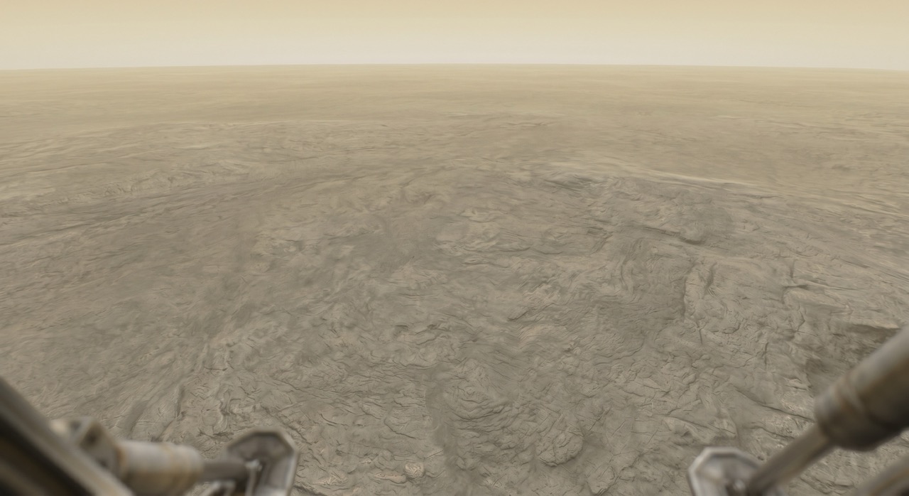 The surface of Still Here at approach: rock worn smooth by something longer than erosion, the landscape having made its peace with age by ceasing to be interesting in the ways that younger places are interesting.