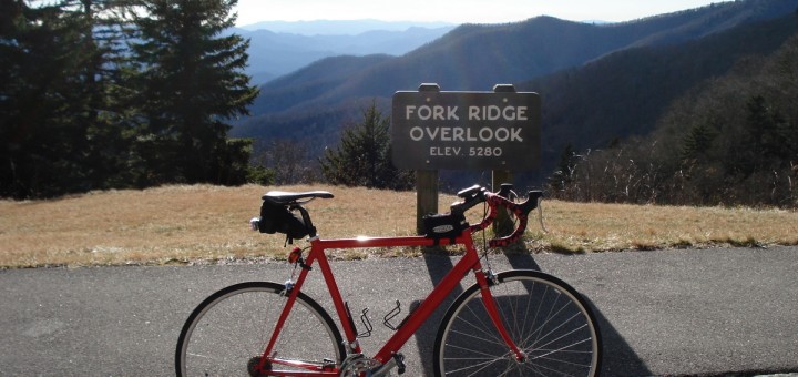 Red bike on the parkway